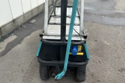 Berg electro transport trolley on pneumatic tires with mechanical scissor.