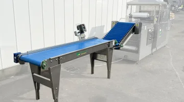 Christiaens Einlaufband mit Elevator für Kommkommersealer