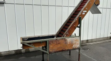 Compas elevator incline conveyor with dosing conveyor