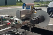 Crea-Tech labelling machine for flower sleeves