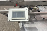 Crea-Tech labelling machine for flower sleeves