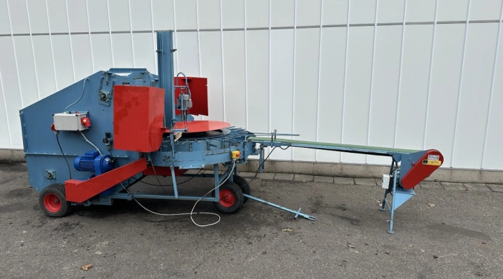 Demtec 900 potting machine with discharge conveyor