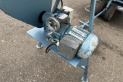 Demtec 900 potting machine with discharge conveyor