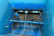 Demtec 900 potting machine with discharge conveyor