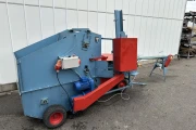 Demtec 900 potting machine with discharge conveyor