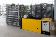 Devette destacking machine for Danish trolleys