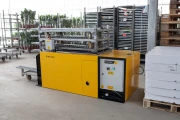 Devette destacking machine for Danish trolleys