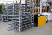 Devette destacking machine for Danish trolleys