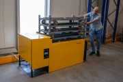 Devette destacking machine for Danish trolleys, in- and output on other side