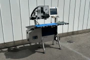 Espera ES5000 check weigher with top and bottom labeler