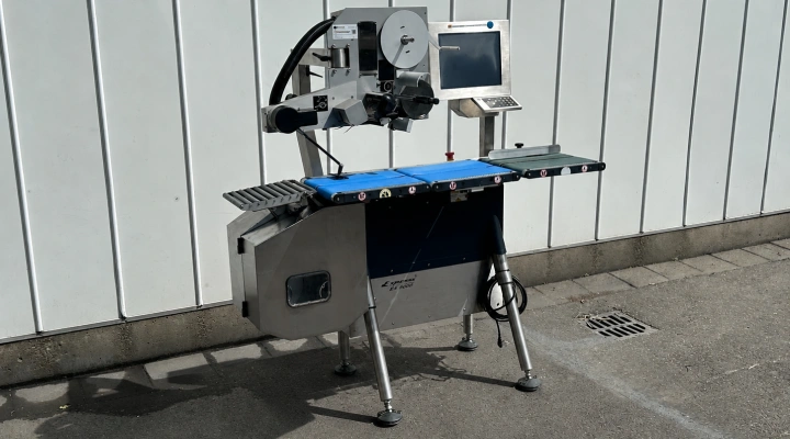 Espera ES5000 check weigher with top and bottom labeler