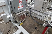 Flier labelling machine for trays