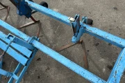 Hak hoeing machine with lifting cylinder