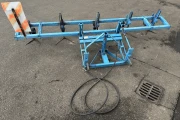 Hak hoeing machine with lifting cylinder