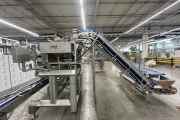 Newtec PCS2009 weigher with Ilapak Carrera 500 flowpack machine for trays