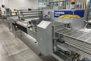 Newtec PCS2009 weigher with Ilapak Carrera 500 flowpack machine for trays