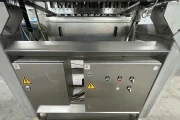 Newtec PCS2009 weigher with Ilapak Carrera 500 flowpack machine for trays