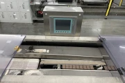 Newtec PCS2009 weigher with Ilapak Carrera 500 flowpack machine for trays