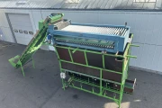 Kerian roller grader with bunker