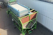Kerian roller grader with bunker