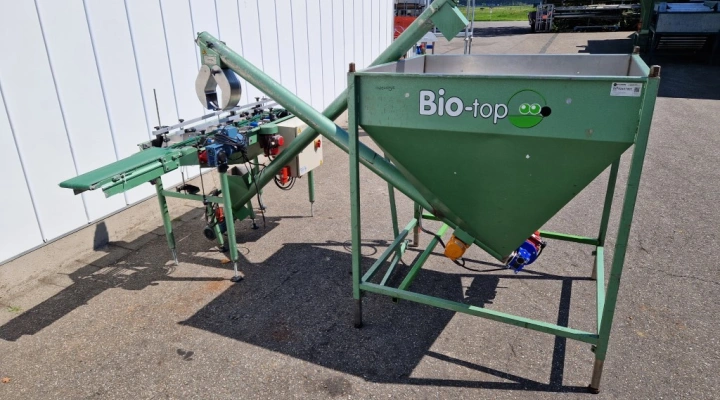 Linthorst pot topping machine