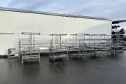 Marco combi conveyor production and packaging line with 11 Marco work tables with scales