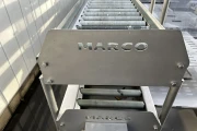 Marco combi conveyor production and packaging line with 11 Marco work tables with scales