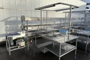 Marco combi conveyor production and packaging line with 11 Marco work tables with scales
