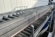 Marco combi conveyor production and packaging line with 11 Marco work tables with scales