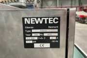 Newtec 2014A weigher with 2 x PEB 40AE bag filling machine with tape closing