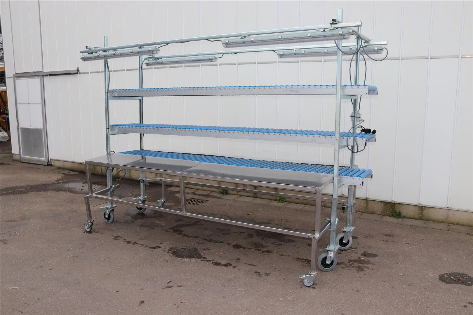 Paktafel Rvs Dubbele RVS tafels met 3 rollenbanen • Duijndam Machines