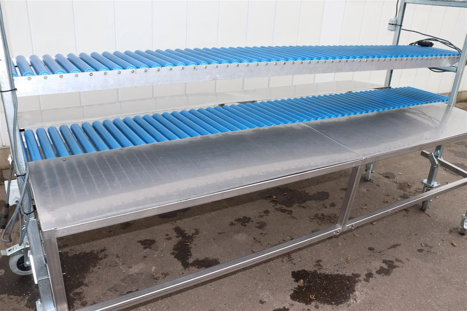 Paktafel Rvs Dubbele RVS tafels met 3 rollenbanen • Duijndam Machines