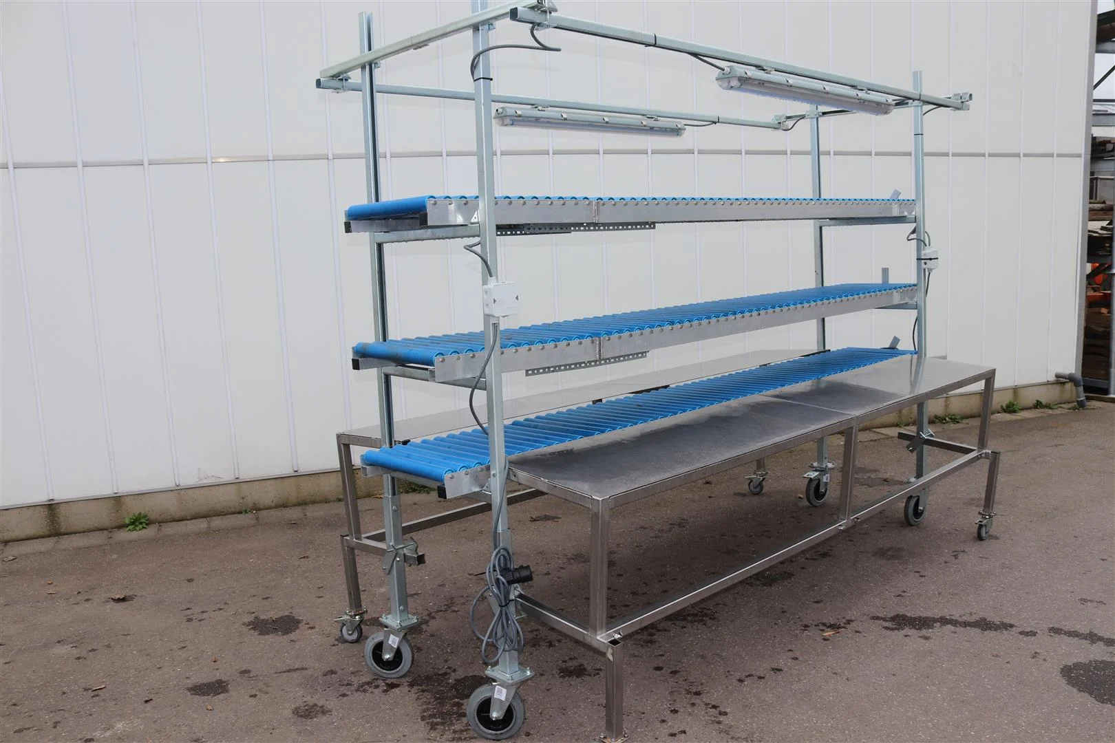 Paktafel Rvs Dubbele RVS tafels met 3 rollenbanen • Duijndam Machines