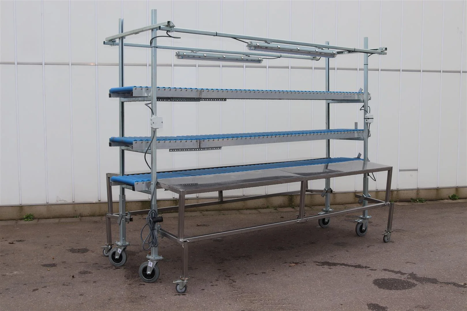 Paktafel Rvs Dubbele RVS tafels met 3 rollenbanen • Duijndam Machines