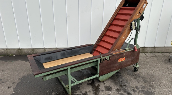 Schouten elevator incline conveyor with dosing conveyor