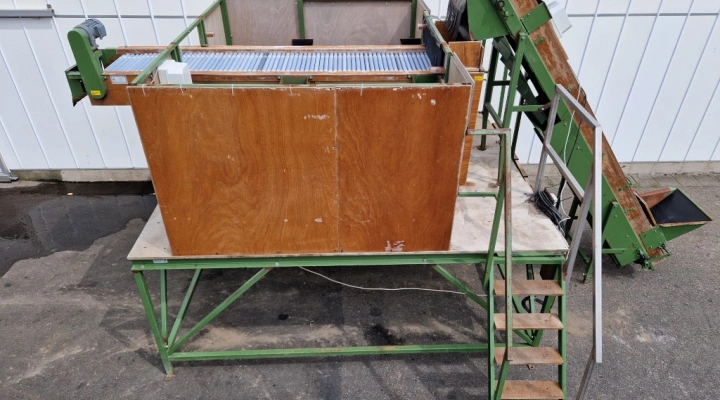 Schouten rollenleesunit met toevoerband