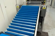 Sorpak Christiaens 5000-64-315 cucumber wrapping machine with supply conveyor