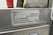 Sorpak Christiaens 5000-64-315 cucumber wrapping machine with supply conveyor