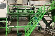 Tumoba Kerian sorting line for brussels sprouts with bunkers and roller inspection conveyor