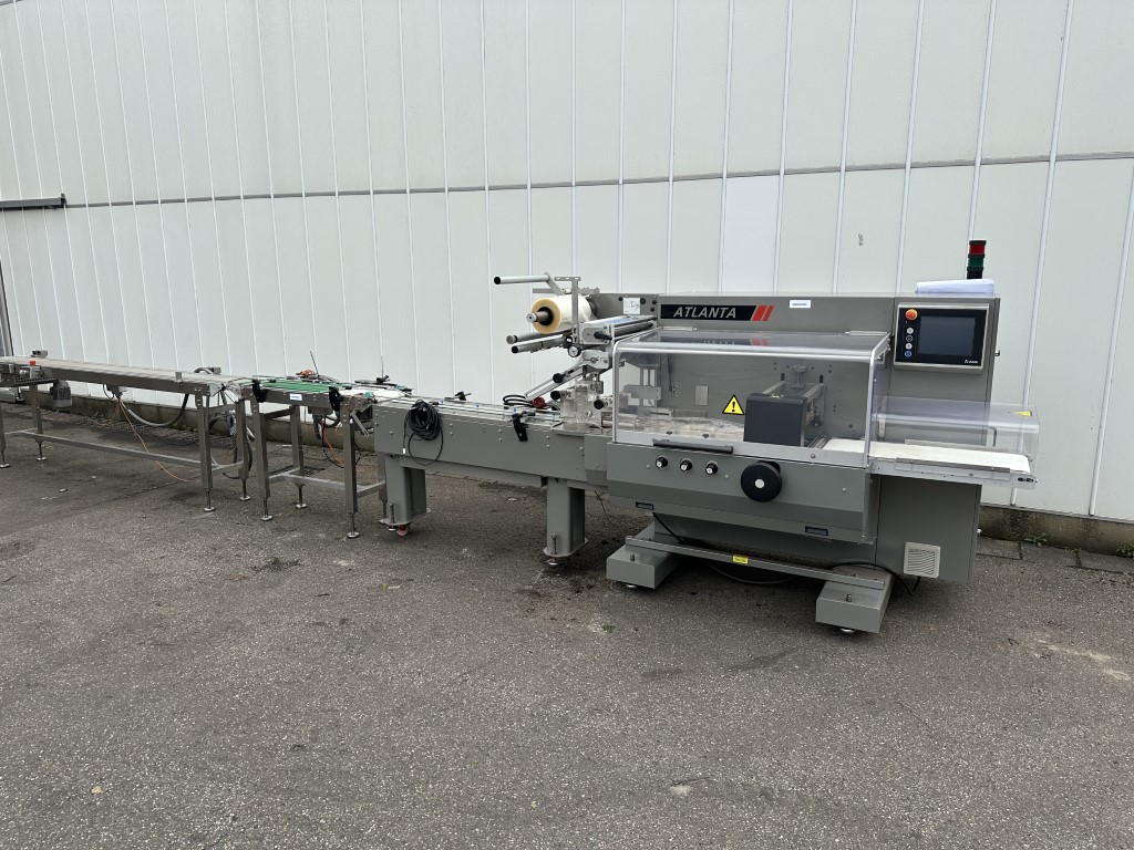 Ulma Atlanta E ����������� ������ ����-��� (Flow pack) � �������� ����������