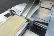 : Ulma PV-350 LSHI flow pack machine with feeding conveyor