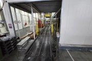 Viscon Atlas Automatic gantry palletizer for plastic fruit and vegetable crates , with automatic crate infeed and pallet transport.