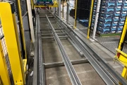 Viscon Atlas Automatic gantry palletizer for plastic fruit and vegetable crates , with automatic crate infeed and pallet transport.