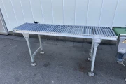 Visser PSL2 Granette tray seeding machine with supply conveyor and discharge roller conveyor