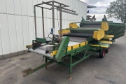 Visser receiving hopper with roller cleaning unit for potatoes