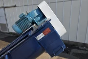 Visser screw conveyor to mix soil and water