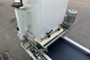 Visser VD-450 tray covering machine with roller conveyor
