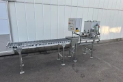 Visser VD-450 tray covering machine with roller conveyor