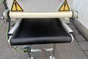 Visser VD-450 tray covering machine with roller conveyor