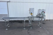Visser VD-450 tray covering machine with roller conveyor